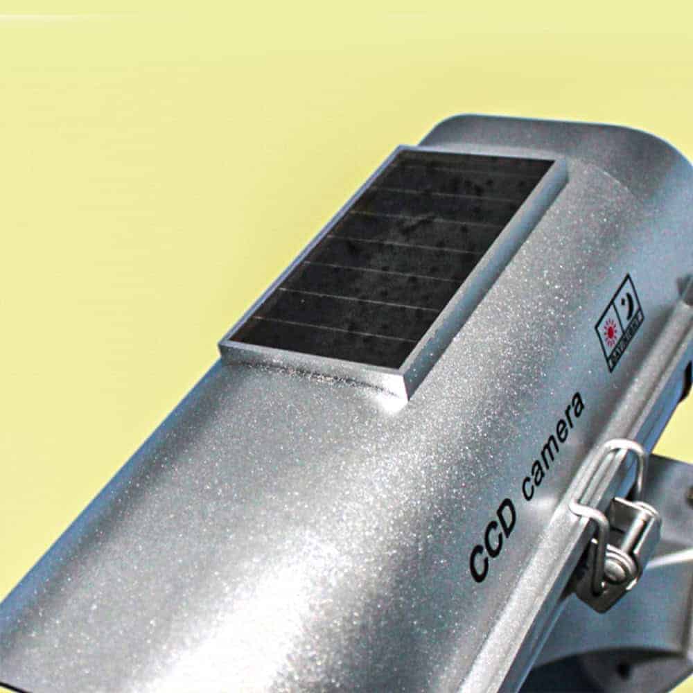 Solar Powered Dummy Camera with Motion Activated Flashing LED: This security device mimics a real camera, deterring potential intruders. It features a motion-activated flashing LED, enhancing its deterrent effect without the need for actual recording or complex installation. It's a cost-effective way to add a layer of security to any property