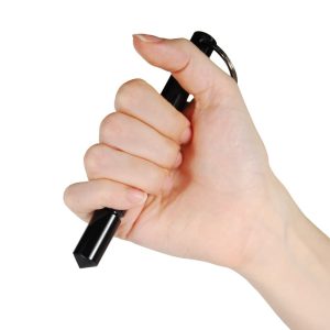 Black Kubotan Aircraft Grade Aluminum Keychain in Hand