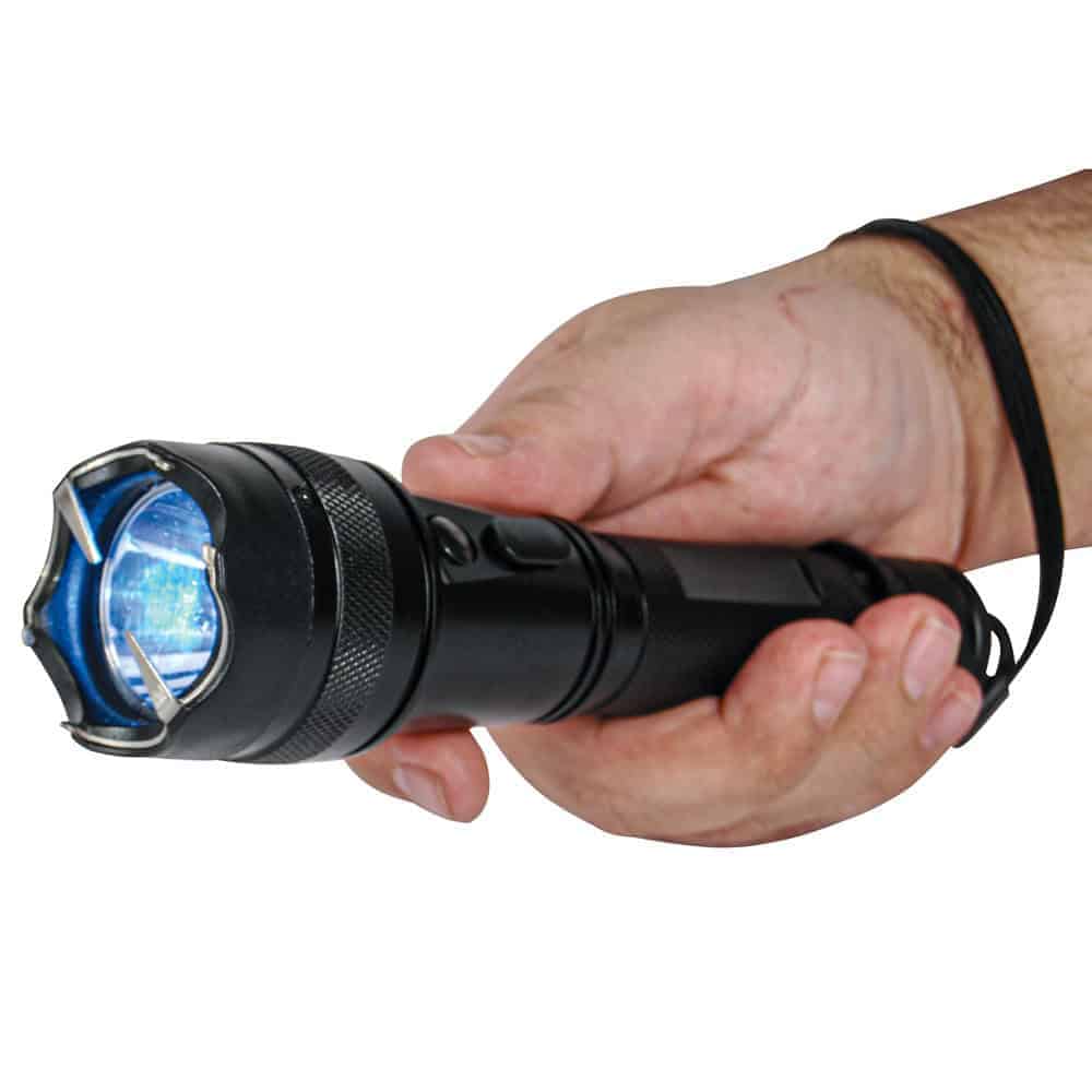 75 Million Volt Shorty Flashlight Stun Gun with Wrist Strap, Holster, and Charging Cable - Shown in Hand