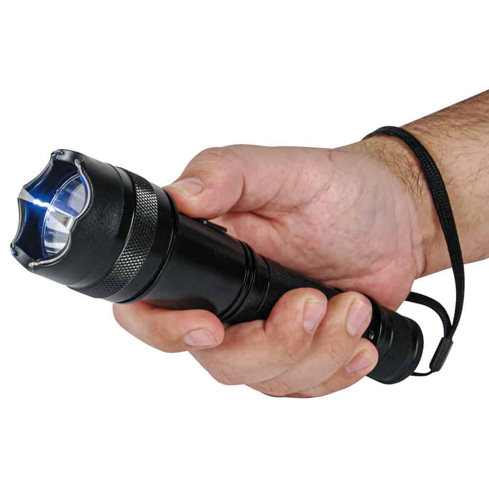 75 Million Volt Shorty Flashlight Stun Gun with Wrist Strap, Holster, and Charging Cable - Shown in Hand